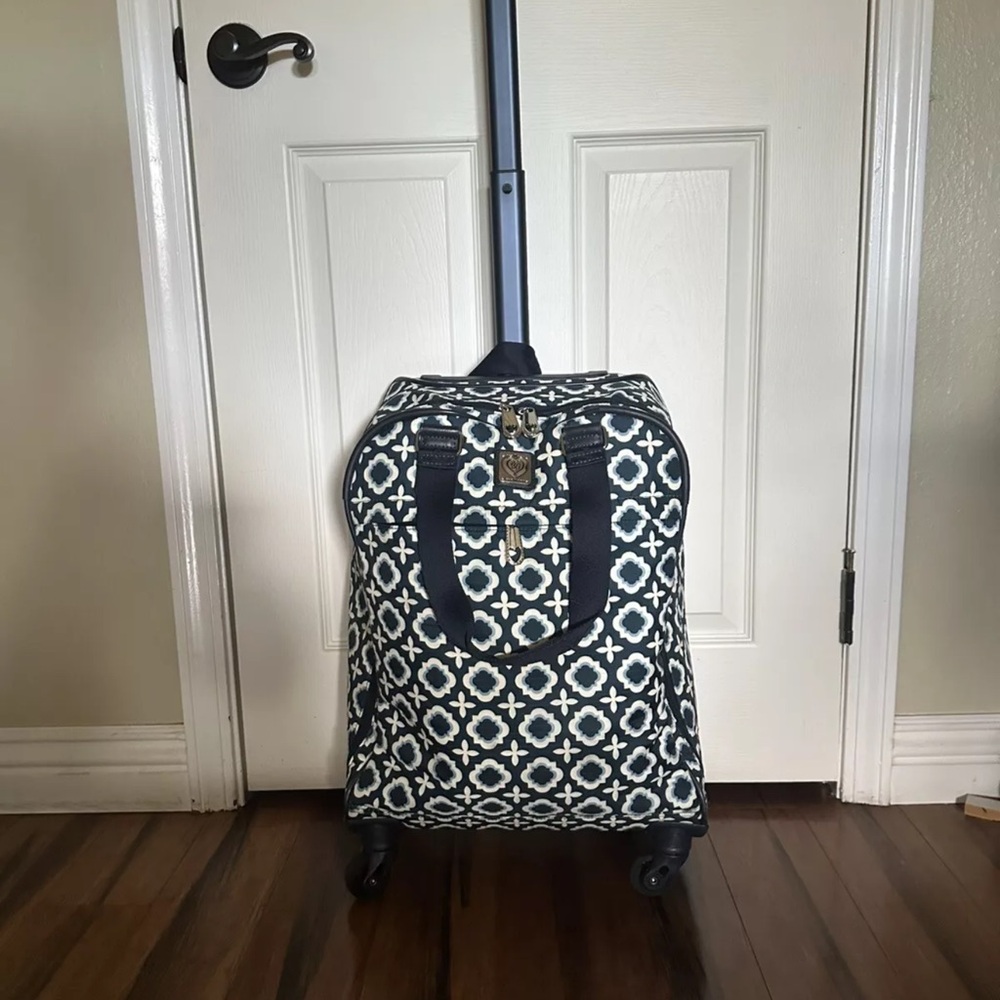 Brighton spinner carry on luggage. Price is firm as it inc xtra shipping costs